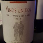 A wine bottle: Vinos Unidos Red Wine Blend Sierra Foothills